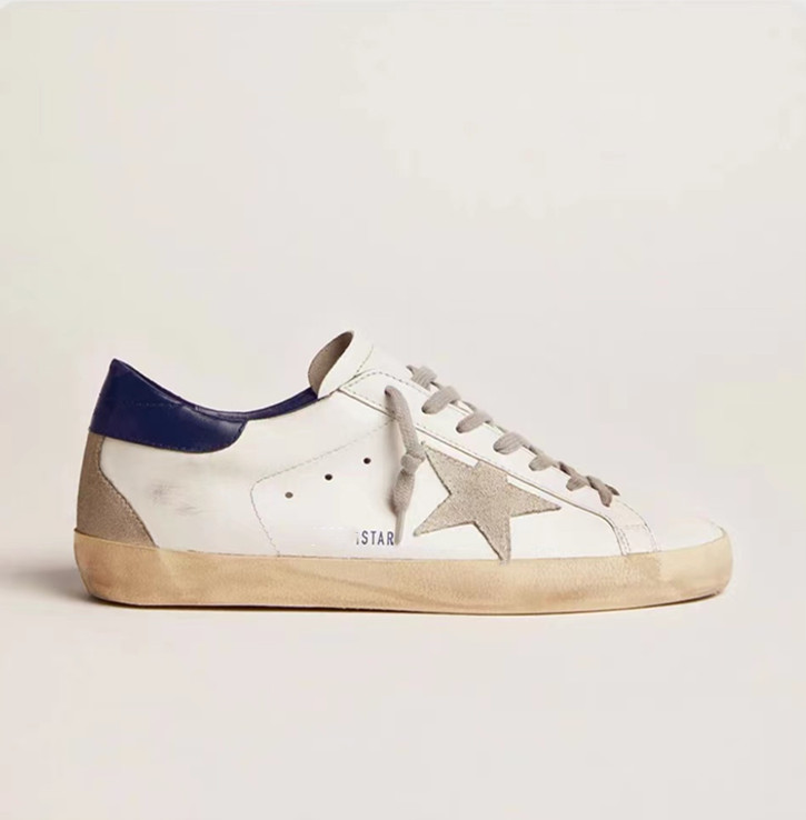 3b731d_721d8baf67df425f9f427622eb8a4c36mv2.png Golden Goose Sneaker Navy White Beige