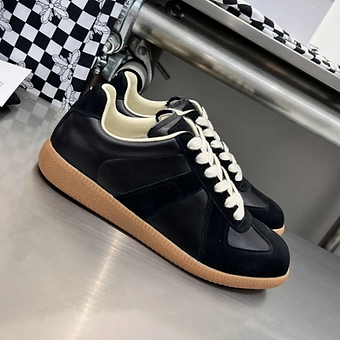 3b731d_34e8617279ca4b4da8cb4978db289159~mv2 Maison Margiela Gats Black