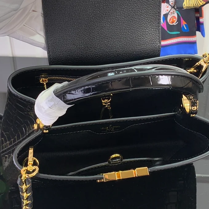 5c0623_30c111e971e84332876430269eeced27~mv2 LV Handbag Black Leather