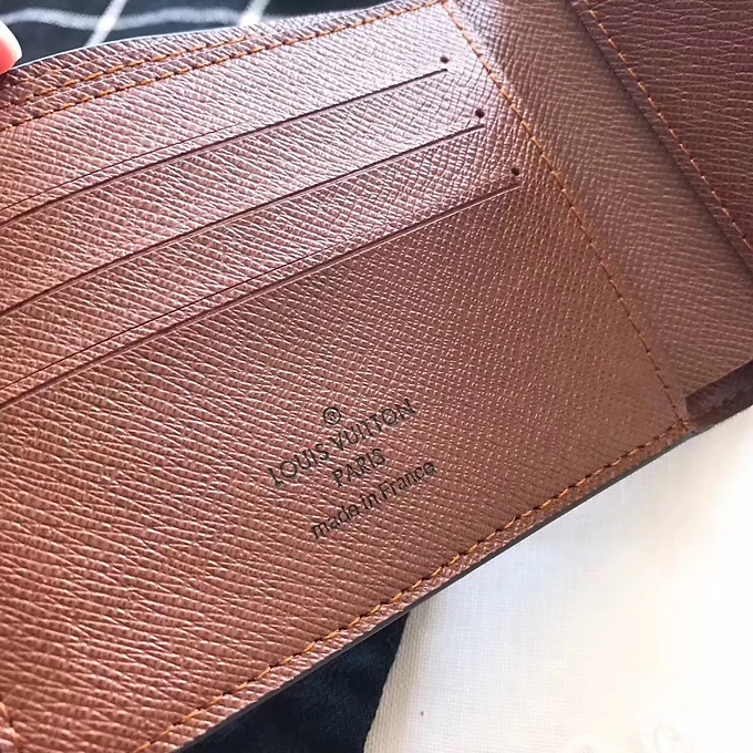 5c0623_6ee9e985892c40699fe4595fdb70bbe6~mv2 LV classic wallet brown