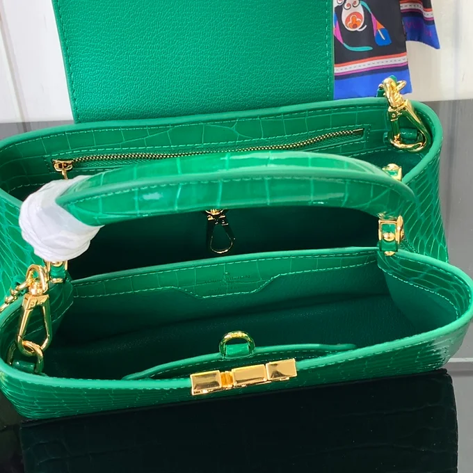 5c0623_9881d5684a6d481186a51b5d8b539e61~mv2 LV Handbag Green Leather