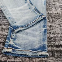 Amiri jeans baby blue side logo