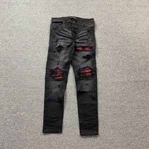 Amiri jeans red black