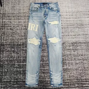 Amiri jeans baby blue side logo