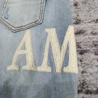 Amiri jeans baby blue side logo