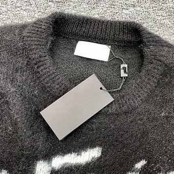 3b731d_fc9e86cefcfb41b2912168820d53326b~mv2 Yves Saint Laurent Knit