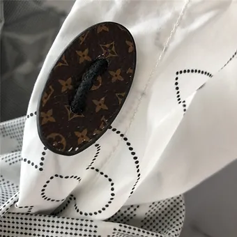 5c0623_c10212df78ab424d89fba8e523f7bae8~mv2 Louis Vuitton raincoat