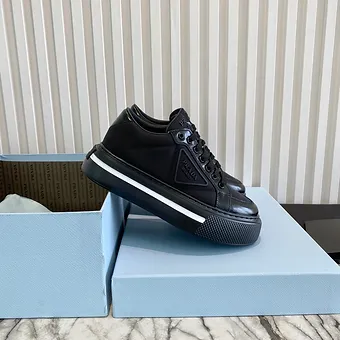cad729_96aedcc7554e416c8a726df31703633f~mv2 Prada Macro Re-Nylon and leather sneakers