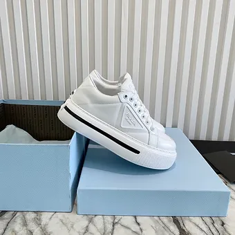 cad729_c74092b03c01417f9ab410c3556979f7~mv2 Prada Macro Re-Nylon and leather sneakers