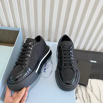 cad729_e2d5cb07b6f9436abee1dadb123461d0~mv2 Prada Macro Re-Nylon and leather sneakers