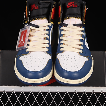 d39d3d_febfe91ee4e84c219d4cf4ad4c725e73~mv2 UN stitching black and blue toe